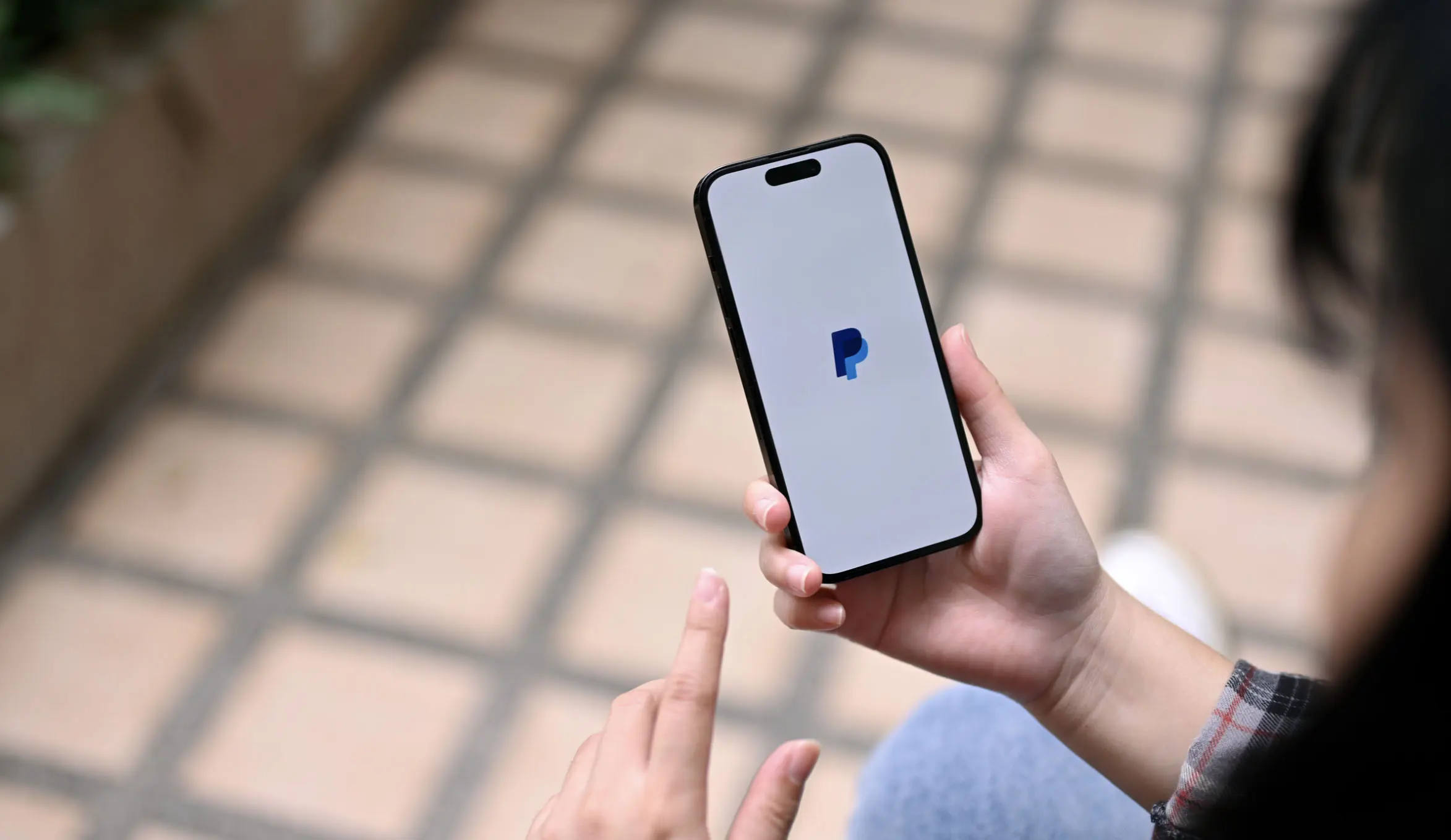 Person using the PayPal app